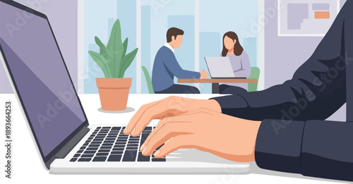 People working on laptops in a modern office space, a plant in foreground