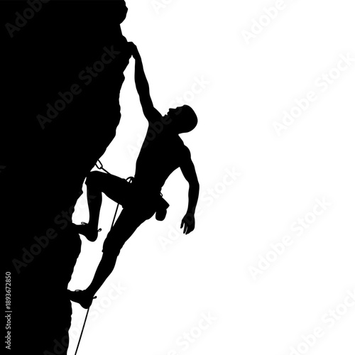 Silhouette of a Man Rock Climbing on a Cliff.