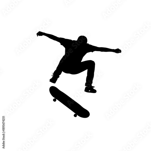 Silhouette of Skateboarder Performing Jump Trick in Mid-Air.