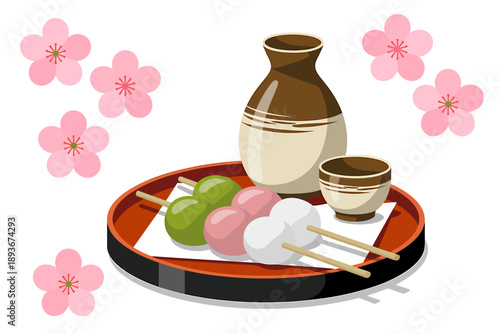 Traditional Japanese sake bottle and cup with mochi on a plate and pink cherry blossoms