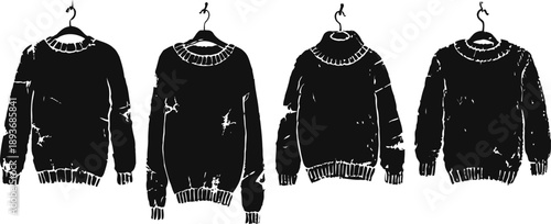 worn knitted sweater silhouettes hanging on hangers with ragged holes and frayed edges