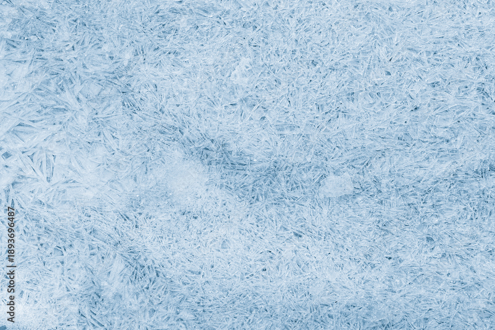 Obraz premium Ice texture crystal background. Textured, crunchy, frosty blue surface of ice.