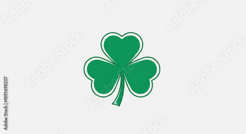 Green four leaf clover with white outline on light gray background symbolizing luck and fortune