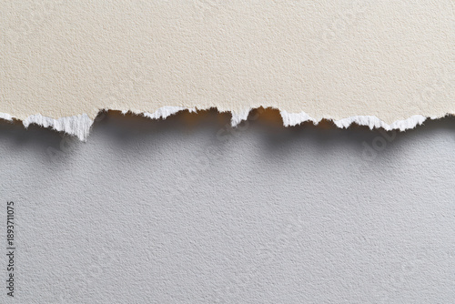 Conceptual paper transition with torn paper edge revealing darker layer beneath, realistic fiber texture, neutral colors, clean composition, creative stock background