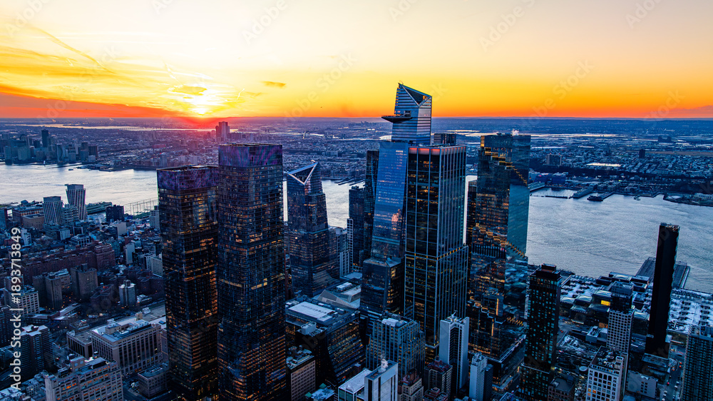 Obraz premium Hudson Yards skyline at sunset. Aerial view of Hudson Yards skyline overlooking the Hudson River at sunset