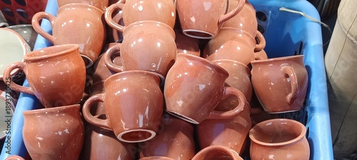These are handcrafted ceramic kullad cups. 
They are typically made of ceramic or clay terracotta. 