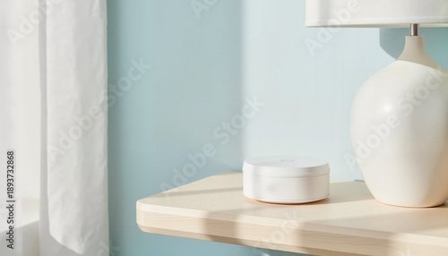 Wallpaper Mural Minimalist table with white lamp and round container in soft light   Torontodigital.ca