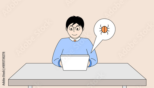 Man is sitting at a desk with a laptop in front of him