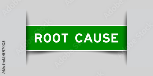 Green color square shape sticker label with word root cause inserted in gray background