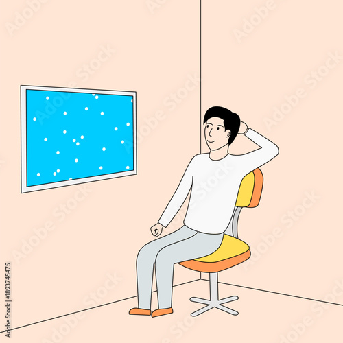 Man is sitting in a chair in front of a window