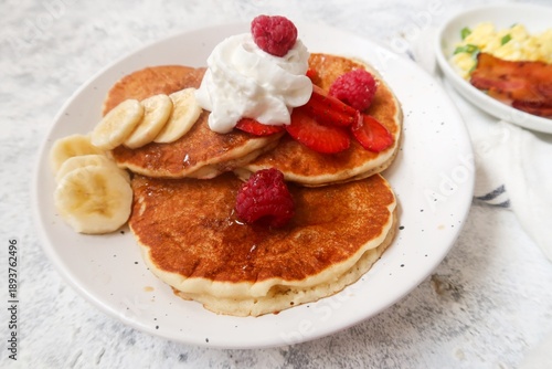 Gluten free almond meal pancakeds served with fresh berries