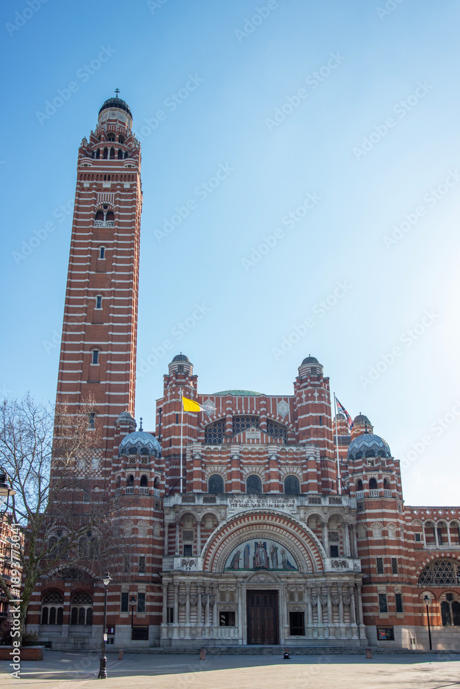 Fototapeta premium Westminster Cathedral and campanile tower against clear blue sky, London