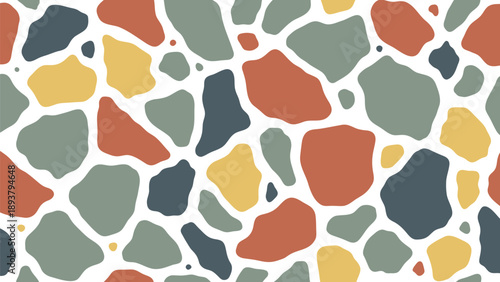 Colorful abstract terrazzo pattern with orange yellow gray and black shapes on white background