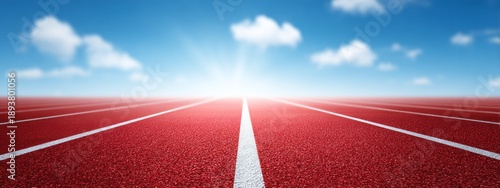 Wallpaper Mural A vivid red running track leads into the horizon, inviting athletes to chase their dreams. Under a wide blue sky, the scene inspires motion and determination Torontodigital.ca
