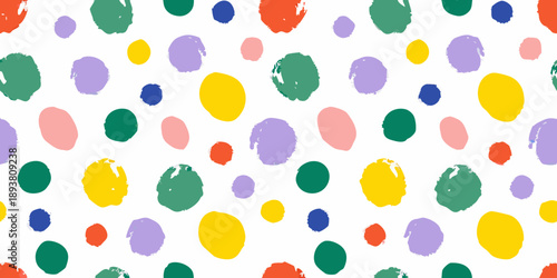 Colorful abstract pattern of irregularly shaped paint blots on white