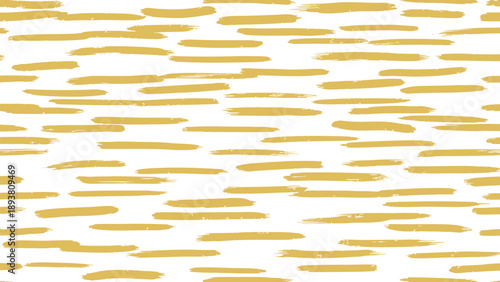 Golden brush stroke pattern on white background for design and decoration