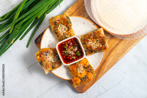 Photography Rice paper wraps are light Vietnamese rolls filled with fresh vegetables herbs noodles and proteins wrapped delicately for a refreshing healthy meal