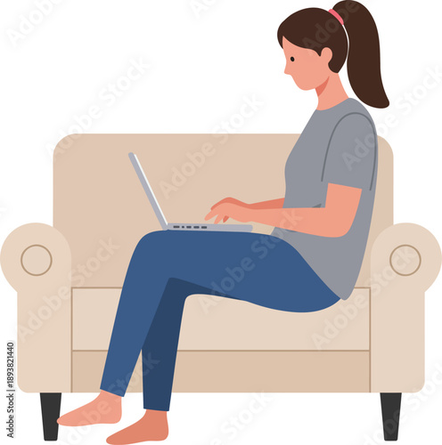 Young Woman Working on Laptop Computer While Sitting Comfortably on a Modern Beige Sofa at Home