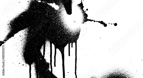 Abstract black paint splatters and drips on a white background creating a grunge texture.