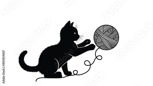 a black cat playfully batting at a ball of yarn silhouette