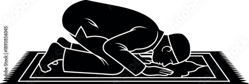 Black silhouette of a person praying on a prayer mat