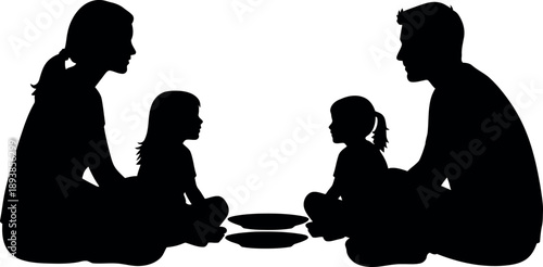 Black silhouette of family with two children sitting on floor facing each other eating white background