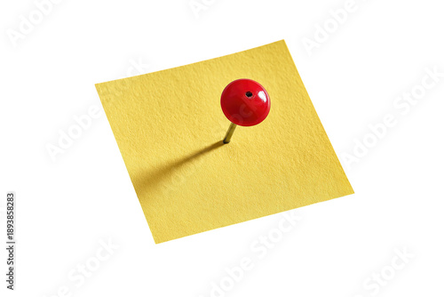 A yellow sticky note with a red pushpin