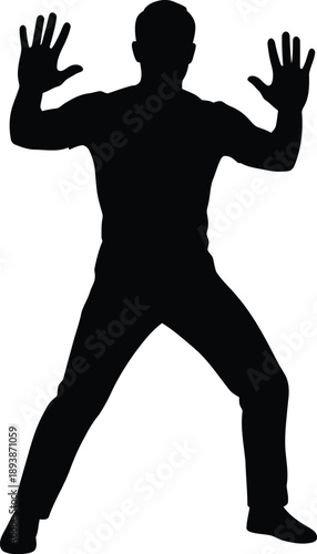 Silhouette of a man with hands up in surrender or defensive pose
