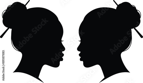 Silhouette of two women facing each other with traditional hair buns and hair sticks