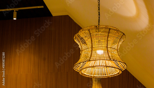 Beautiful and artistic rattan lamps adorn the ceiling of the house.