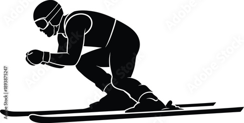 Black silhouette of a skier in motion