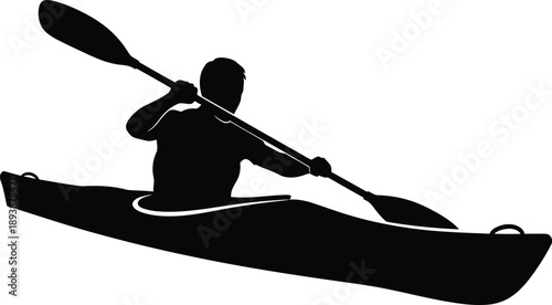 Silhouette of a person kayaking on water