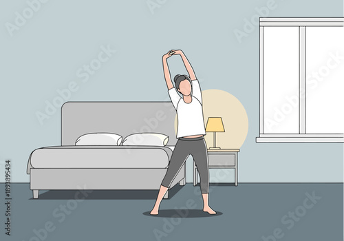 Woman stretching arms above head for morning exercise routine beside bed and nightstand in bedroom interior warm light