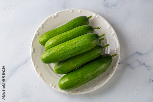 Fresh cucumber slices in bowl