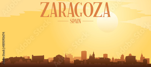Golden yellow panoramic poster of the city skyline with misty background buildings and clouds of ZARAGOZA, SPAIN