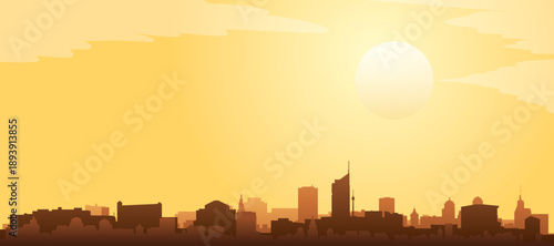 Golden yellow panoramic poster of the city skyline with misty background buildings and clouds of VIENNA, AUSTRIA