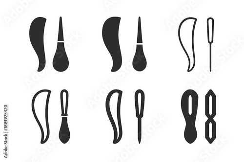 Bookbinding Tool Logos. Bookbinding. Icon set. Set Logo of Bookbinding: bone folder and awl tools. harmonious logo variations of the same emblematic concept,