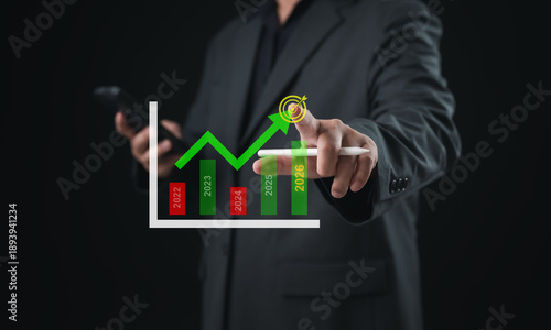 Obraz na płótnie Business performance growth concept with upward financial chart and target icon,