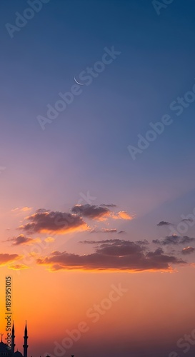 Wallpaper Mural Sunset over the Mosque silhouetted minaret, moon, warm colors, soft light, vertical, peaceful, religious architecture, evening, beautiful sky. Torontodigital.ca