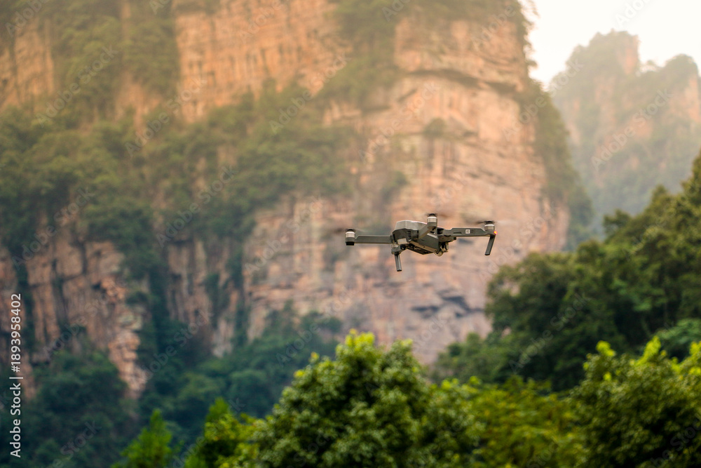 Fototapeta premium The drone with the professional camera takes pictures in Zhangjiajie national forest park,Wulingyuan,Hunan,China