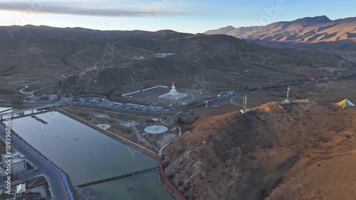The White Pagoda of Daocheng County at dusk
