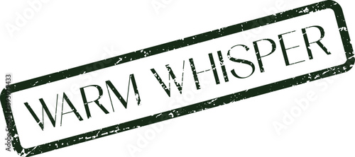 A distressed green rubber stamp impression featuring the words Warm Whisper for gentle communication