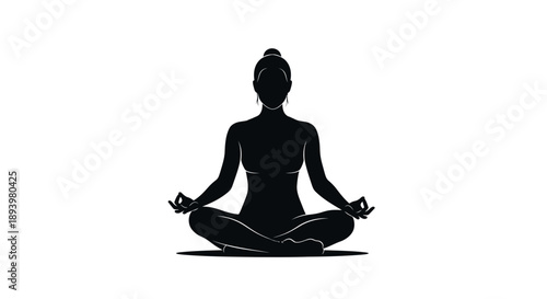 Woman sitting in lotus position meditates peacefully in serene environment 