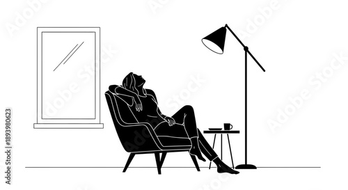 Woman relaxing in a chair with a cup of coffee beside her,scene