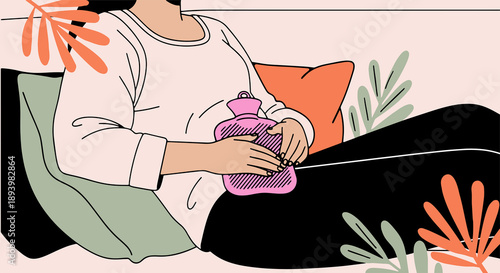 Woman with hot water bag experiencing period cramps 