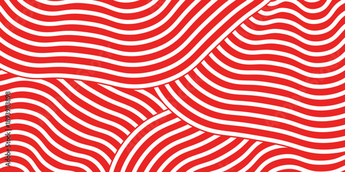 A close up shot of chopsticks lifting white noodles against a red background.