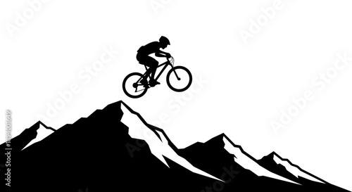 Mountain biker silhouette riding on a mountain peak