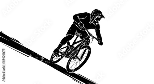 Mountain biker performing a steep downhill descent