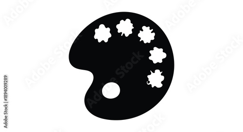 A stark black silhouette of an artist s palette with various paint splotches representing creativity and art silhouette high quality professional