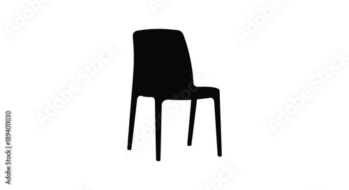 A stark black chair is prominently displayed against a completely white background creating a minimalist silhouette high quality professional detailed